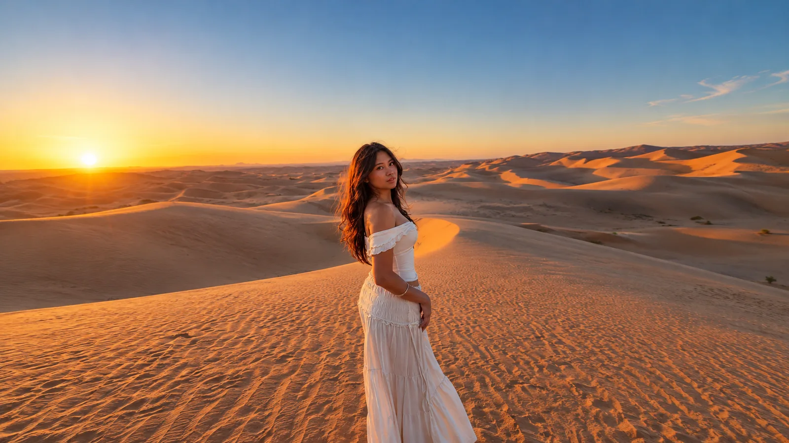 Woman enjoying golden sunrise dunes on a Morning Desert Safari in Abu Dhabi